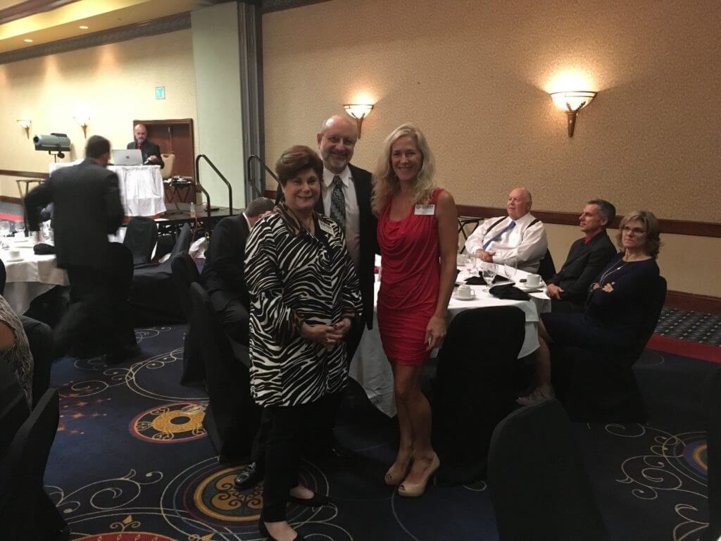 Veterans Home Care’s Howard and Bonnie Laiderman visit with ESGR Military Outreach Coordinator Jeanne Savel.
